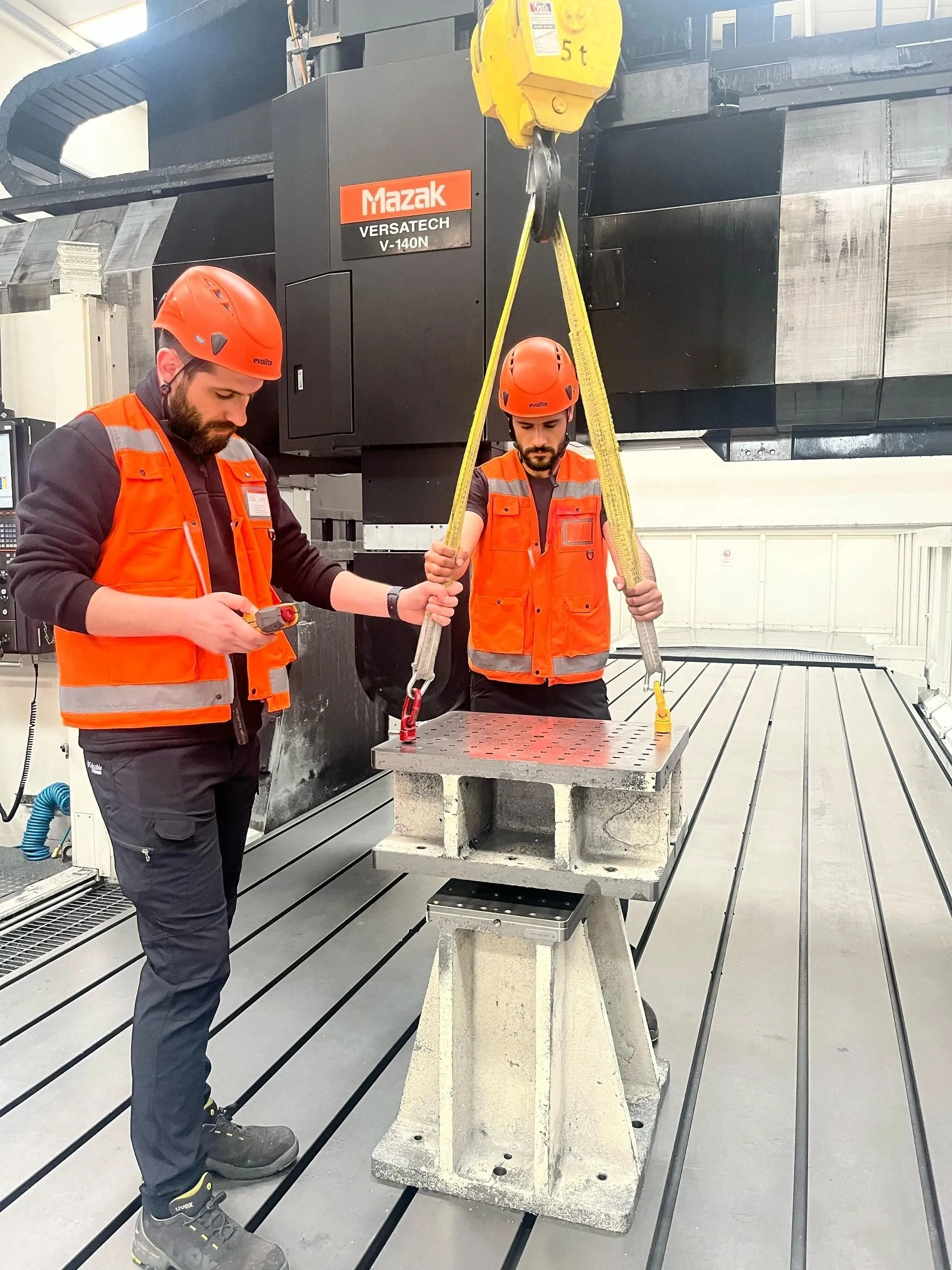 Our team during a part replacement on a machine