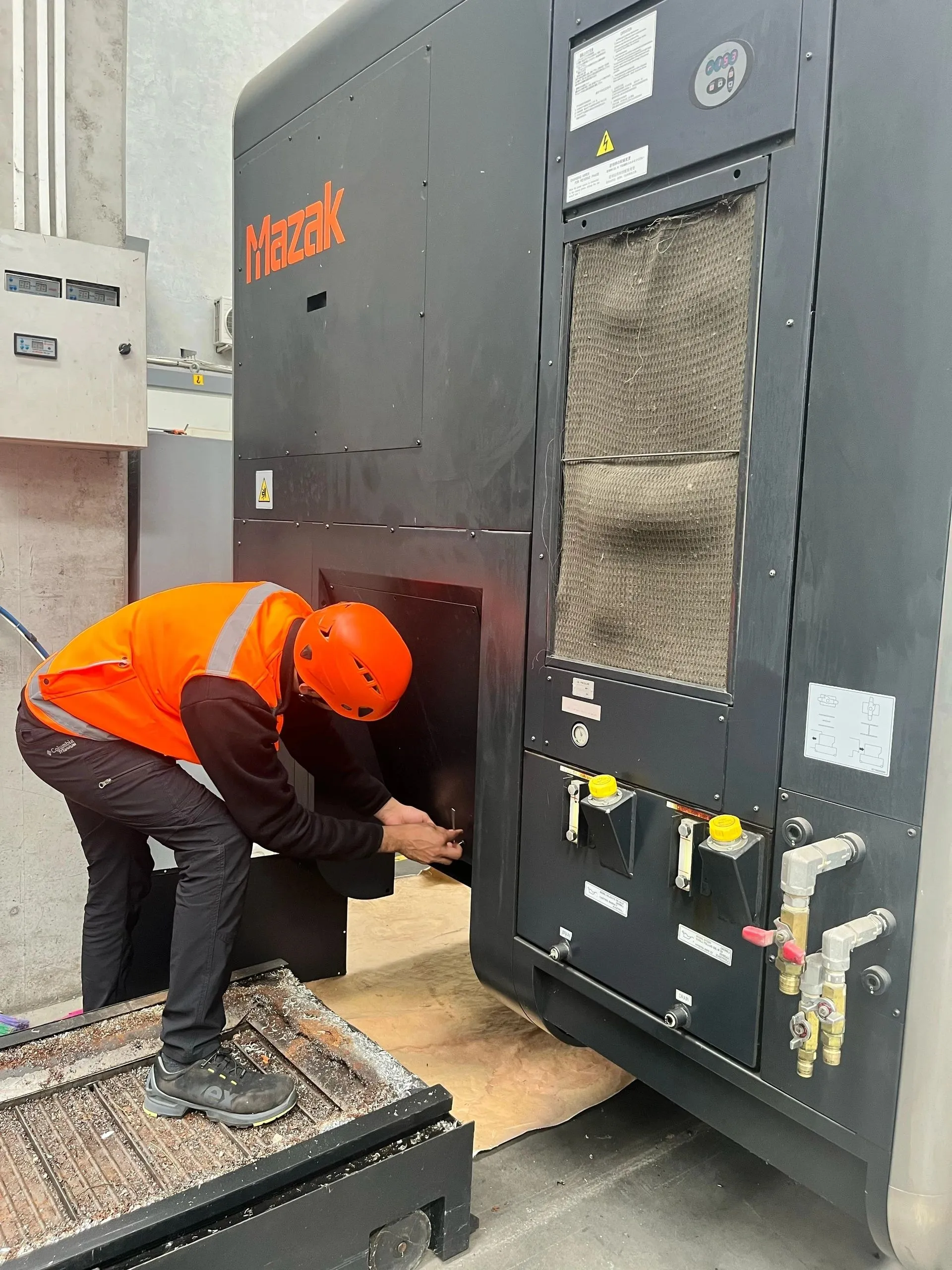 Service work at the electrical cabinet of a machine